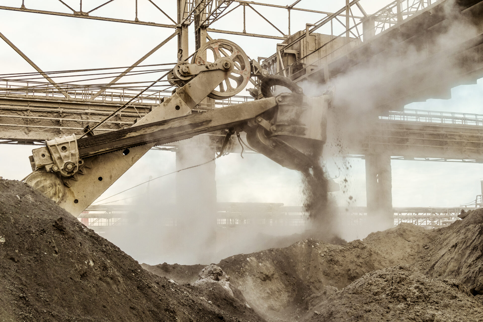 Industrial material-handling equipment operating in a dusty environment (use case for work involving heavy dust or odors)